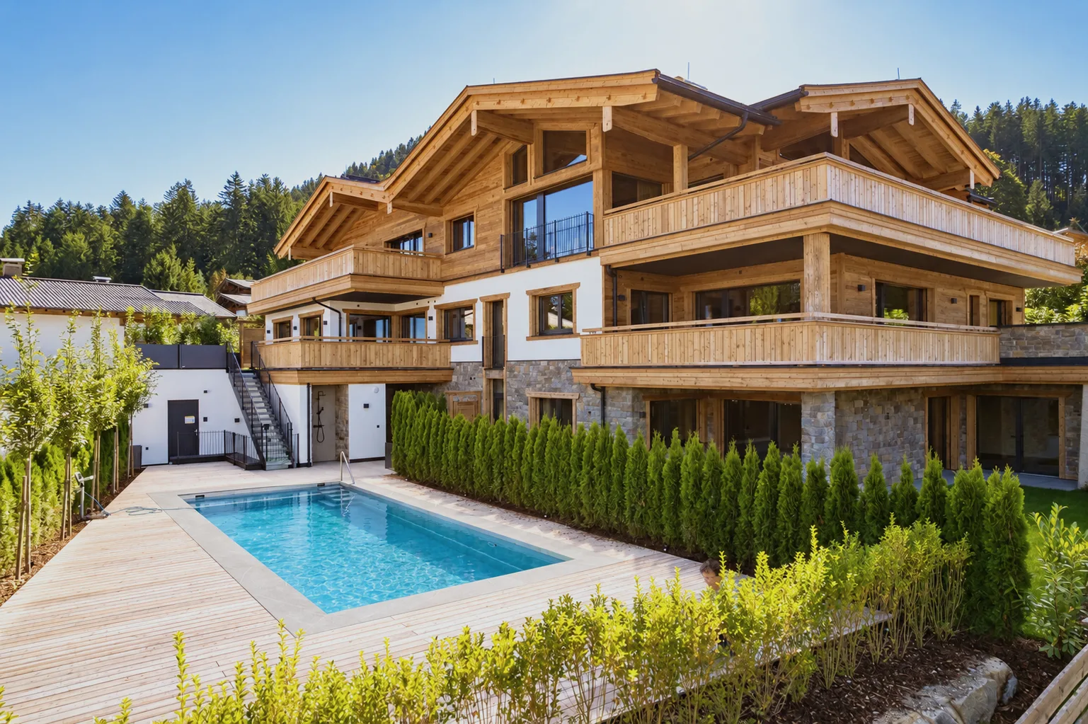 Miete: Ski in / Ski out – Neubauwohnung mit Kaiserblick & Pool